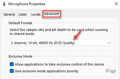 In the Microphone Properties window, go to the "Advanced" tab.
Under the "Default Format" section, select a different format from the drop-down menu.