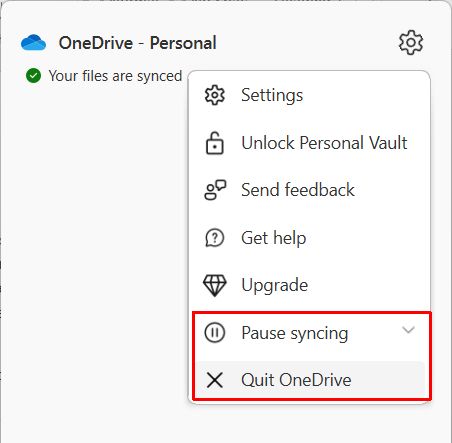 Right-click on the OneDrive icon in the system tray.
Select "Close OneDrive" from the context menu.